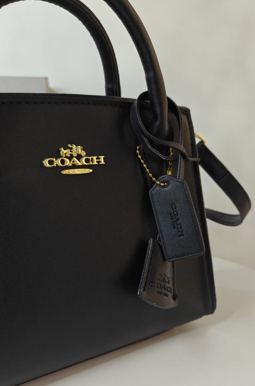 COACH ANDREA CARRYALL