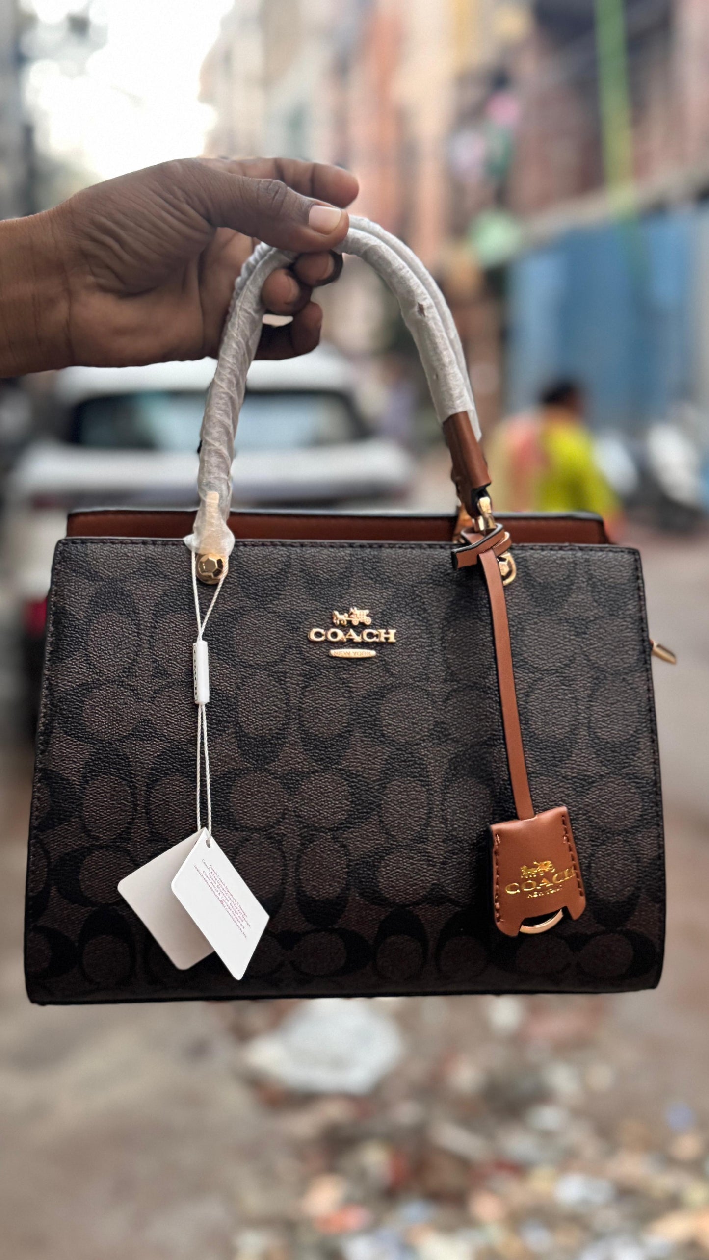 COACH HANDBAGS WITH PARTITION INSIDE AND LONG BELT