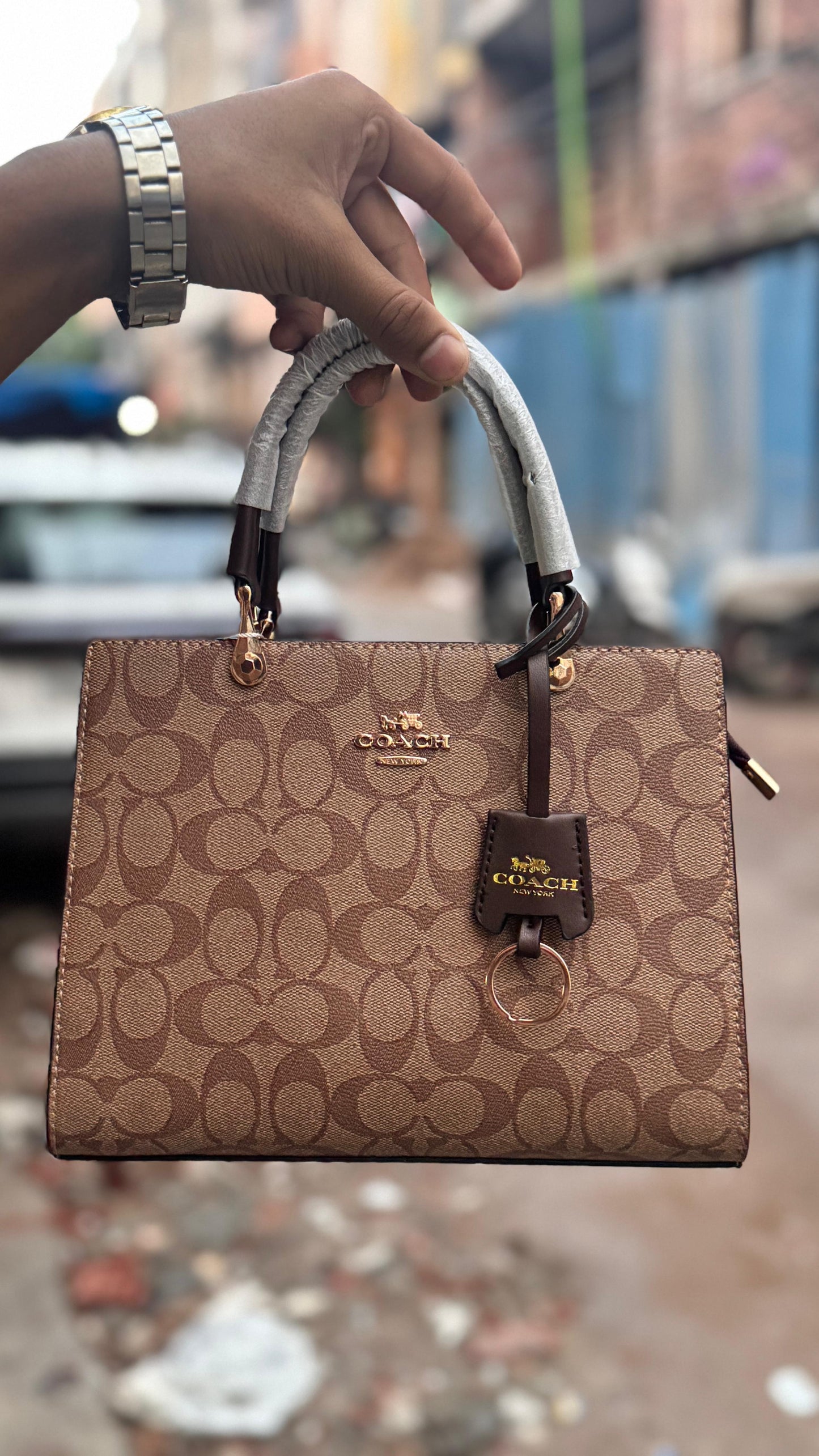 COACH HANDBAGS WITH PARTITION INSIDE AND LONG BELT