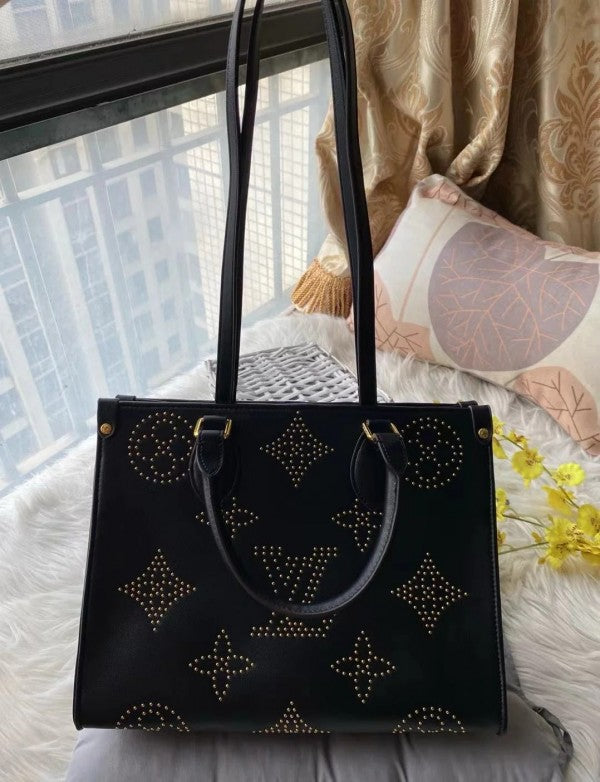 Louis Vuitton On The Go Premium Monogram Empreinte Leather Tote Bag
