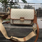 Michael Kors Bradshaw Sling Bags