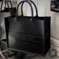 DIOR EMBOSSED LEATHERITE BOOK TOTE