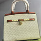 MICHAEL KORS HAMILTON LOCK HANDBAG