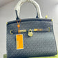 MICHAEL KORS HAMILTON LOCK HANDBAG