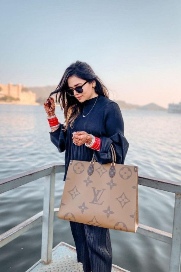 Louis Vuitton On The Go – Monogram Premium Leather Tote Bag