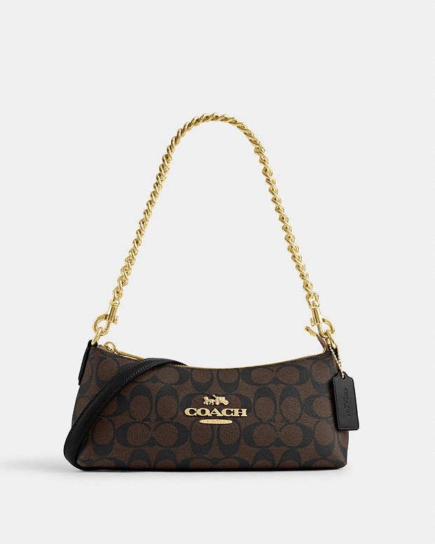 COACH CHARLOTTE HAND SLING BAG