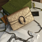 GUCCI GOLD EMBOSSED DIONYSUS