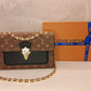 Louis Vuitton Victoire Monogram Handbag