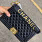 Chanel Lebouy Top Handle Logo Bag In Town