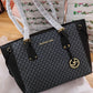 MICHAEL KORS VOYAGER TOTES