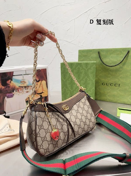 GUCCI OPHIDIA SHOULDER BAG WITH STRAWBERRY CHARM
