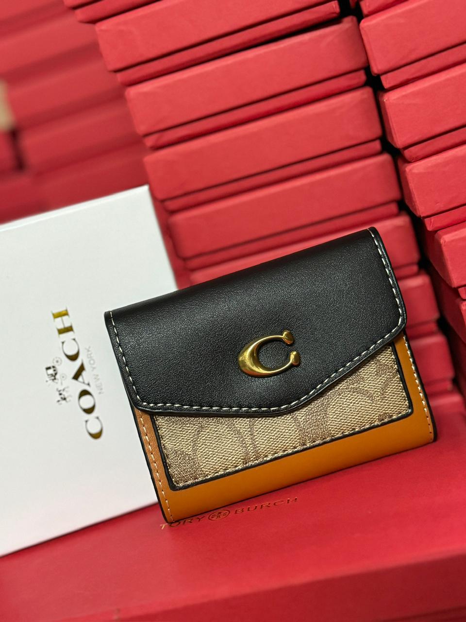 COACH THREE FOLD WALLETS