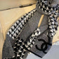CHANEL MUFFLER IN TOWN