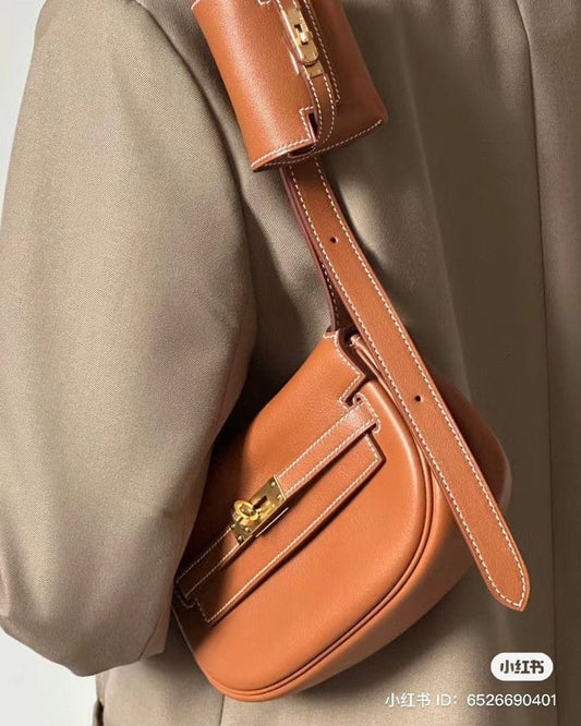 HERMES SWIFT KELLY MOOVE SLING BAGS