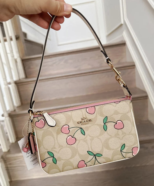 COACH SLING BAGS