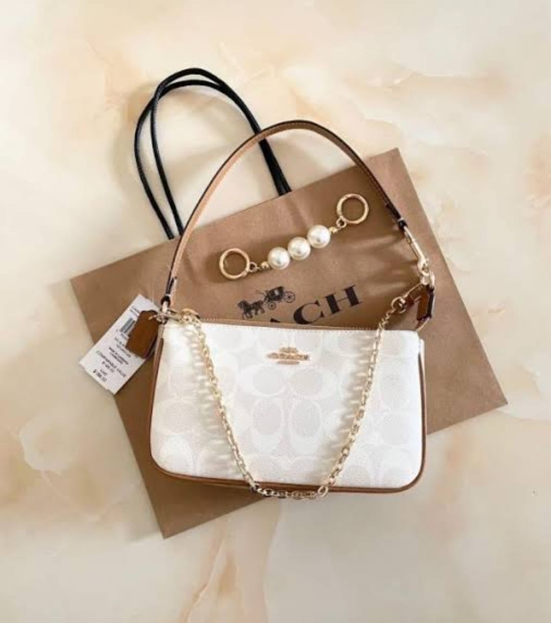 COACH FLORAL SLING BAGS