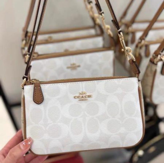 COACH FLORAL SLING BAGS