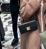 GUCCI AUTHENTIC EMBOSSED GUCCISSIMA PADLOCK WALLET SLING