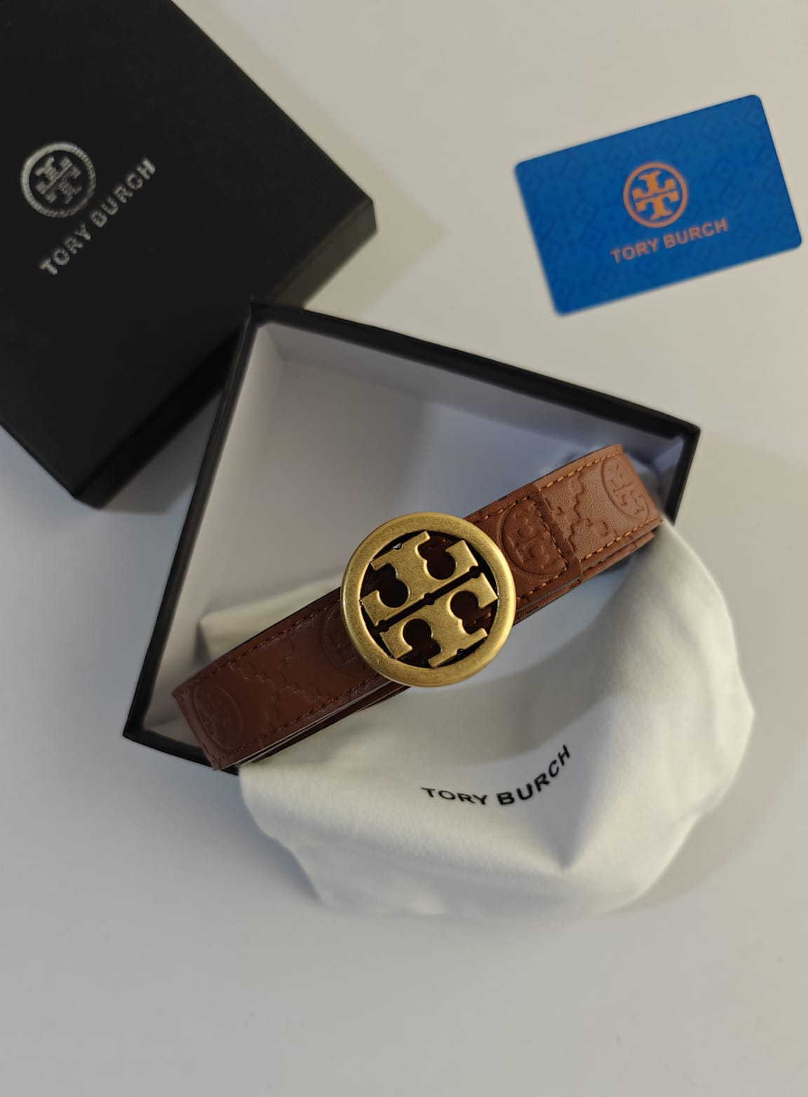 TORY BURCH EMBOSSED BELTS