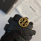 TORY BURCH EMBOSSED BELTS