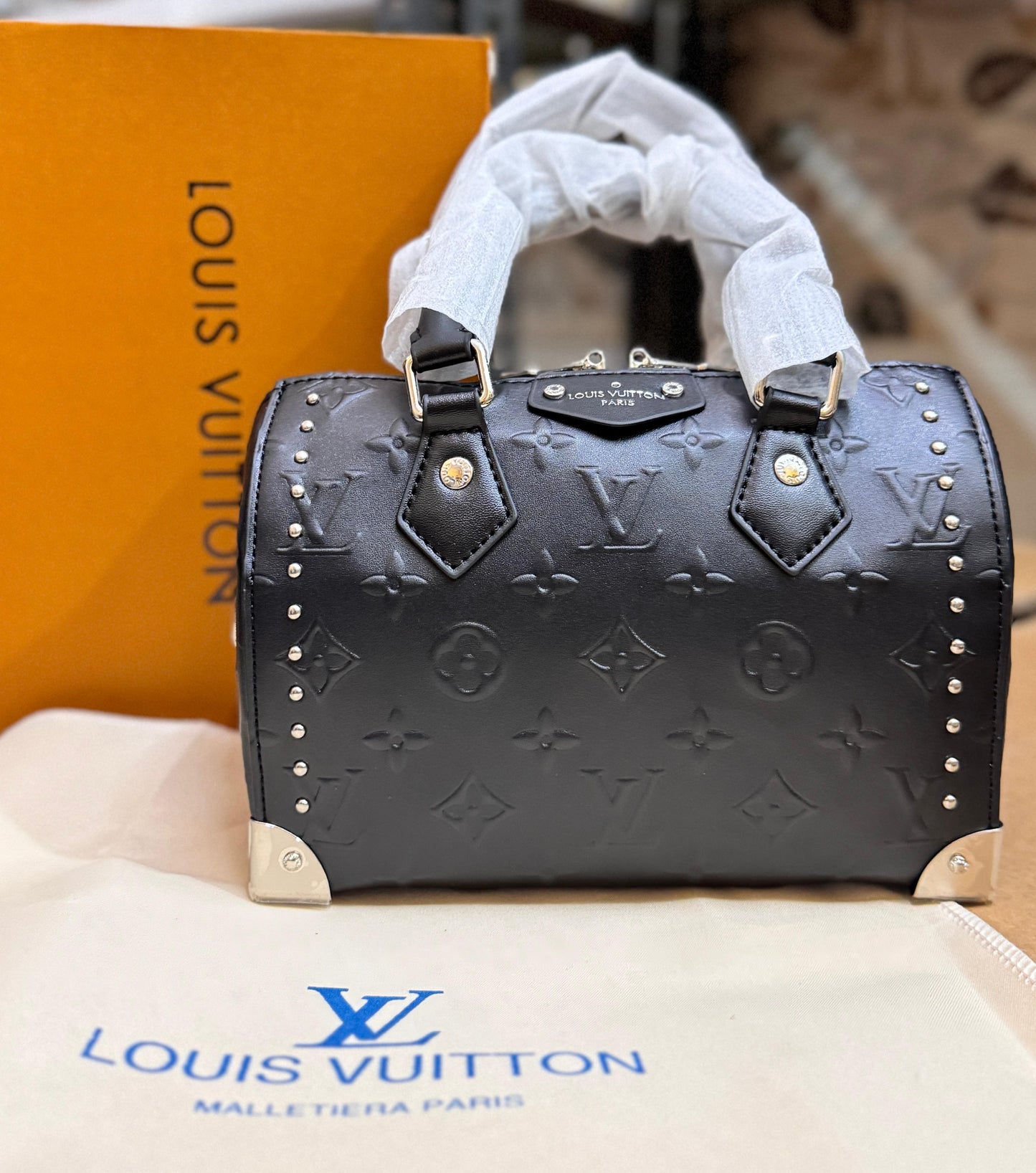 LOUIS VUITTON EMBOSSED CRUISE SPEEDY