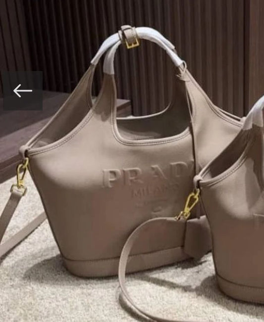 PRADA EMBOSSED LOGO BUCKET BAG