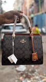 COACH HANDBAGS WITH PARTITION INSIDE AND LONG BELT