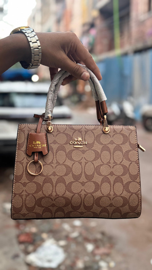 COACH HANDBAGS WITH PARTITION INSIDE AND LONG BELT
