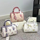 COACH FLORAL SPEEDY