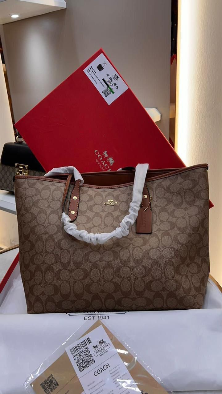 Coach Signature Tote Bags