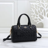 Coach CC Embossed Speedy